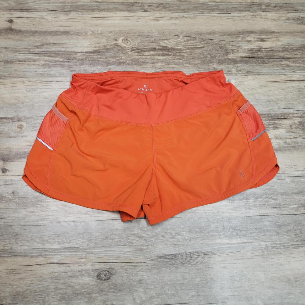 Athleta Running Shorts Womens M Orange Lined Pockets Reflective Athletic